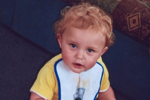 Kronos Grosney died after he was run over in a driveway accident. His great-uncle has appeared in court.