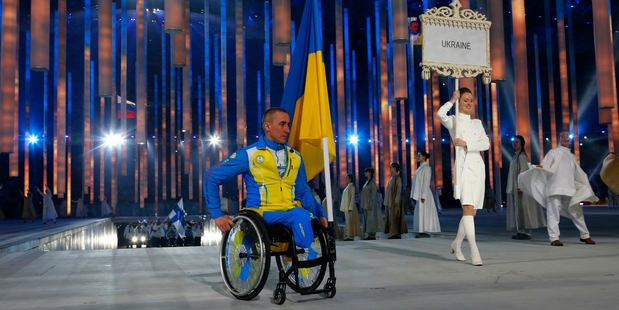Only one of 31 Ukrainian Paralympians attended the opening ceremony parade of the Sochi Winter Paralympics. Photo / AP