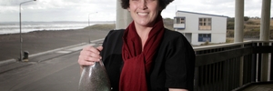 Glass artist Jo Auld with sea-inspired work at the Duncan Pavilion. Ms Auld is one of 10 artists who will be exhibiting at the Pavilion during Artists Open Studios Whanganui. Photo/Bevan Conley