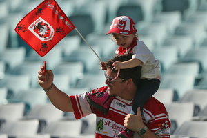 Dragons fans show their support during the round one NRL match between St George Illawarra and the Wests Tigers. Photo / Getty Images