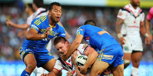 Jacob Lillyman of the Warriors is tackled by the Eels defence during the match against the Parramatta Eels. Photo / Getty Images