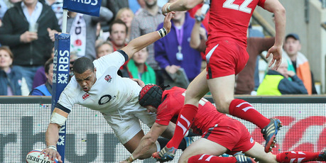 England's Luther Burrell, left, puts the ball down over the line, but his try was disallowed as he was adjudged to have stepped into touch. Photo / AP
