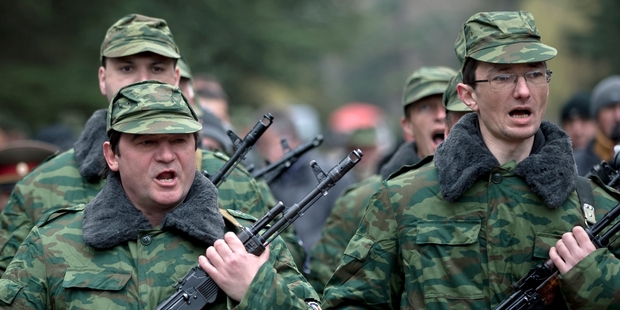 Volunteers in a pro-Russian armed force are sworn in at Simferopol in Ukraine. Photo / AP