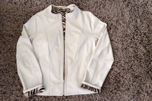 Soft, light, crease-proof, washable, waterproof... Justine Tyerman's lamb skin jacket has earnt her envious looks from friends. Photo / Justine Tyerman