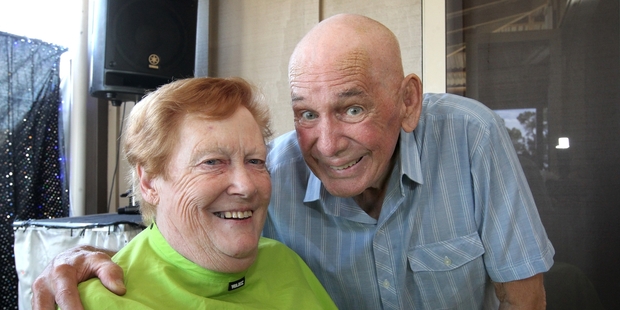 Sloan Woods shows off his freshly shaven head with wife Marion who was about to do the same, at a charity event at JARKS Cafe yesterday. Photo/Duncan Brown