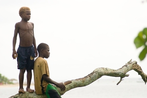 Two boys from Mele village embark on the day's newest adventure. Photo / Creative Commons image by Flickr user Graham Crumb