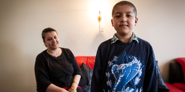 Samir Azizi, with his mother Fazeela Abdullah, wants to study medicine. Photo / Michael Craig