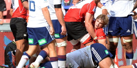 Faf de Klerk of the Lions celebrates a try against the Blues. Photo / Getty
