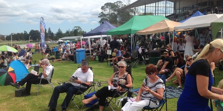 The crowds soaking up the sunshine