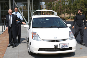 California Gov. Jerry Brown, California State Sen. Alex Padilla and Google co-founder Sergey Brin exit a self-driving car at the Google headquarters. Photo / AP