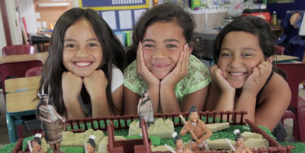 Nine-year-olds Matekohi Gates (left), Waiwhakaata Tangitu and Maraea Puru helped build a model of the Battle of Gate Pa along with classmates Reihana Timms, 8, and Paora Joseph, 7 (both absent). Photo/Andrew Warner