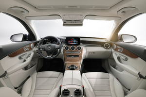 The interior of the Mercedes-Benz C-Class is refined with five air vents and a touchscreen in the dash.