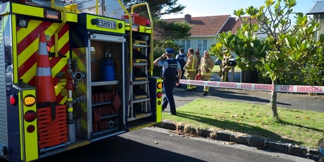Emergency services at the scene of an explosion on Buxton St in Point Chevalier. Photo / Herald on Sunday / Michael Craig