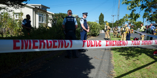 Emergency services at the scene of a suspected P Lab explosion on Buxton St in Point Chevalier. Photo / Herald on Sunday / Michael Craig