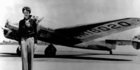 Amelia Earhart stands next to a Lockheed Electra 10E, before her last flight in 1937 from Oakland, California. She disappeared without a trace. Photo / AP