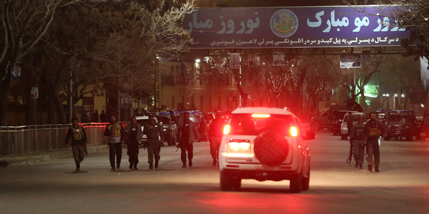 Afghan police forces arrive at the site of a gun battle in Serena Hotel in Kabul, Afghanistan. Photo / AP
