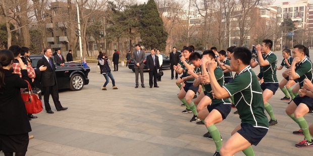 The rugby team at China Agricultural University perform a haka for Prime Minister John Key. Photo / Claire Trevett