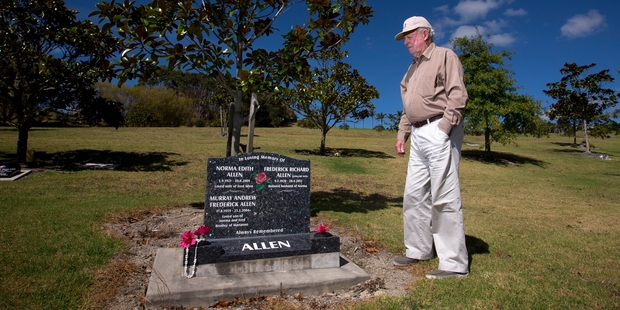 Friend Alan Sayers visits the Silverdale grave of Sir Fred Allen and wife Norma. Photo / Dean Purcell