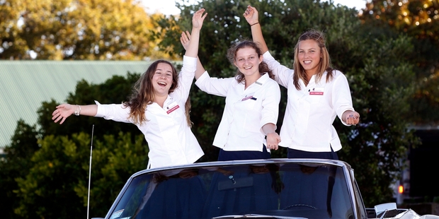 Students Lucy Armstrong, left, Tessa Boyd and Maddie Kidd at the Auckland School Ball Expo. Photo / Chris Gorman