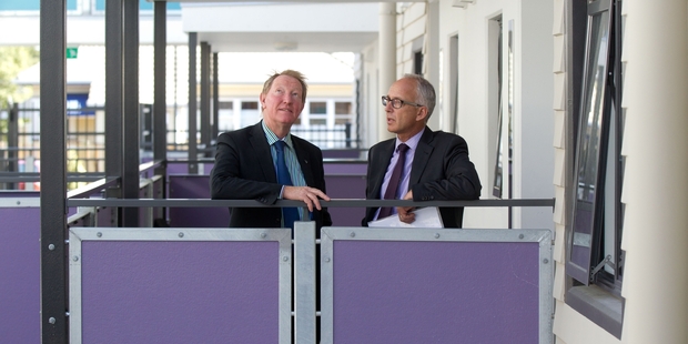 Housing Minister Nick Smith (left) and Housing NZ head Glen Sowry inspect the apartments. Photo / Richard Robinson