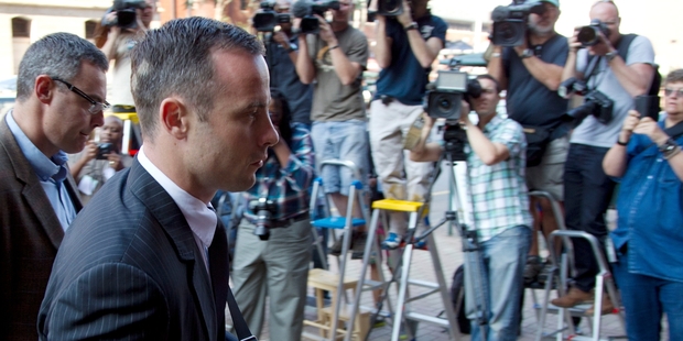 Oscar Pistorius arrives at the High Court in Pretoria. Photo / AP