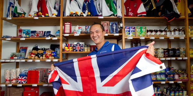 Jason Wong of the Union Jack's British Food Store is all geared up for the royal tour. Photo / Richard Robinson