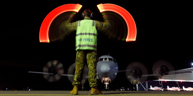 A Royal Australian Air Force AP-3C Orion returns to RAAF base Pearce from a search for Malaysia Airlines Flight 370. Photo / AP