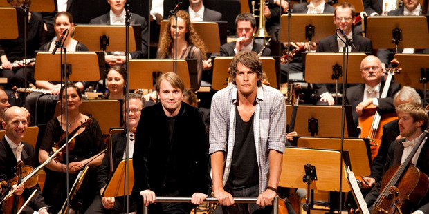 Jeremy Wells with the NZSO and their conductor Pietari Inkinen in The Grand Tour.