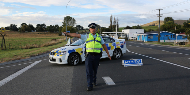Police put a diversion in place a after a crash kills one and traps another at Waimahana on State Highway 5, Reporoa, Rotorua. Photo / SNPA / Peter Graney