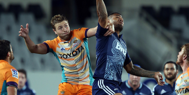 Cheetahs' centre Johann Sadie (left) and Blues back Frank Halai contest a high ball during their controversial match. Photo / Getty Images