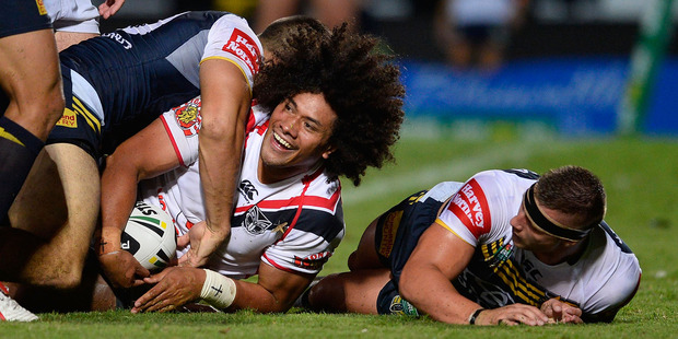 Sione Lousi of the Warriors celebrates after scoring a try during the match against the North Queensland Cowboys. Photo / Getty Images