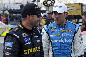 Marcos Ambrose (left) is rumoured to be making a return to V8Supercars in the 2015 season after racing in the US since 2006. Photo / AP