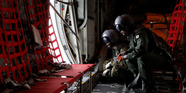 There has been confirmation today that Flight MH370 crashed into the southern Indian ocean, but the search goes on. Photo / AP