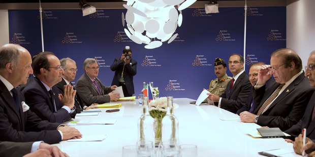 World leaders sit around the table at a bilateral meeting at the Nuclear Security Summit at the Hague. But don't worry - they won't be distracted by women wait staff. Photo / AP