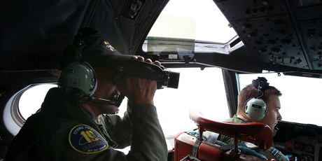 The search goes on for the missing Flight MH370, as satellite images reveal dozens of objects floating in the search area. Photo / AP