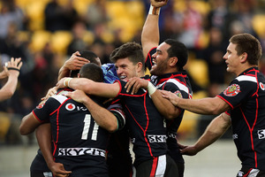 Warriors players celebrate the third try of Glen Fisiiahi during the round four NRL match between the New Zealand Warriors and the Wests Tigers. Photo / Getty Images.