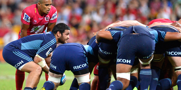 Piri Weepu of the Blues feeds the ball into the scrum. Photo / Getty Images.