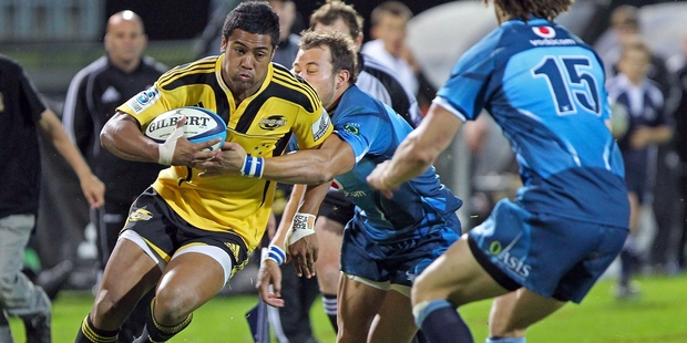 BULLISH: Julian Savea, Hurricanes wing, makes headway against the Bulls at McLean Park in 2011.PHOTO/FILE