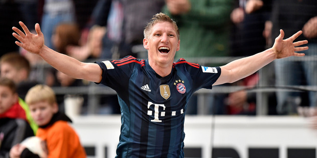 Bayern's Bastian Schweinsteiger celebrates scoring during a German Bundesliga clash against FSV Mainz 05. Photo / AP