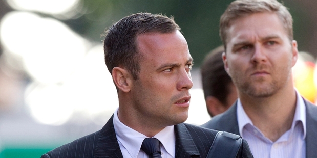 Oscar Pistorius is now seen in public only when going and leaving court. Photo / AP