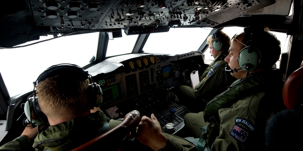 The RNZAF crew's painstaking search of the ocean for clues to the fate of Flight 370 is like trying to find a specific grain of sand on a beach.