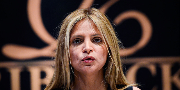 Monica Kelly from Ribbeck Law Chartered speaks to reporters during a press conference. Photo / AFP