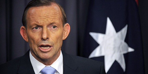 Tony Abbott insists his decision to bring back knights and dames won't harness Australia to the monarchy. Photo / AFP