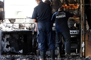 FIERY BLAST: Experts were called in to investigate the gas explosion at the house in Ruakaka. PHOTO/JOHN STONE