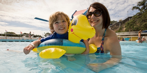 Ryan Rooke, 3, and mother Elize make the most of the warm weather at the Parnell Pools. Photo / Greg Bowker