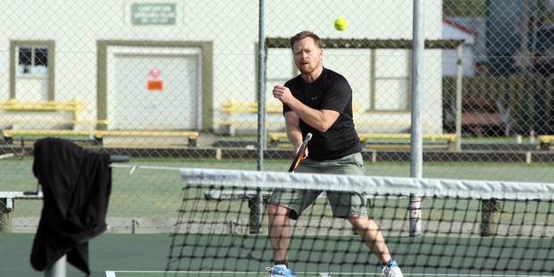 WINNER: Competitor Minty Hunter hits a forehand down the line.