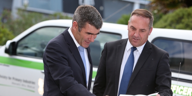 Primary Industries Minister Nathan Guy and his ministry's deputy director general compliance and response Andrew Coleman. Photo / Michael Cunningham