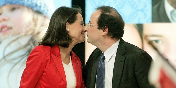 Segolene Royal kisses President Francois Hollande, her former partner. She was this week given a key Cabinet position. Photo / AP
