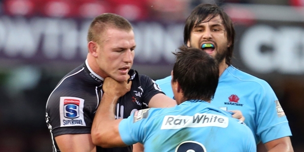 Jean Deysel of the Sharks and Nick Phipps of the Waratahs in one of many incidents. Photo / Getty Images