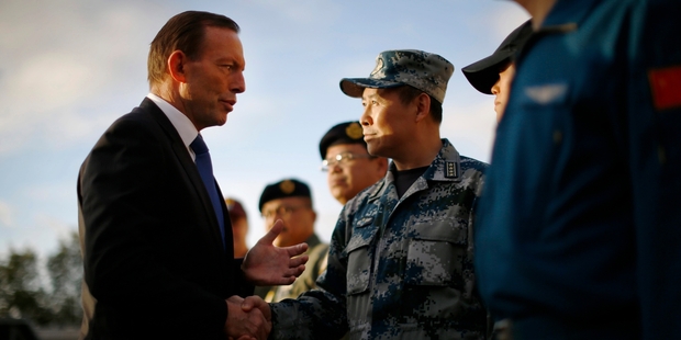 Australian Prime Minister Tony Abbott at Pearce air force base. He will see winning any less than three
WA seats as a defeat. Photo / AP